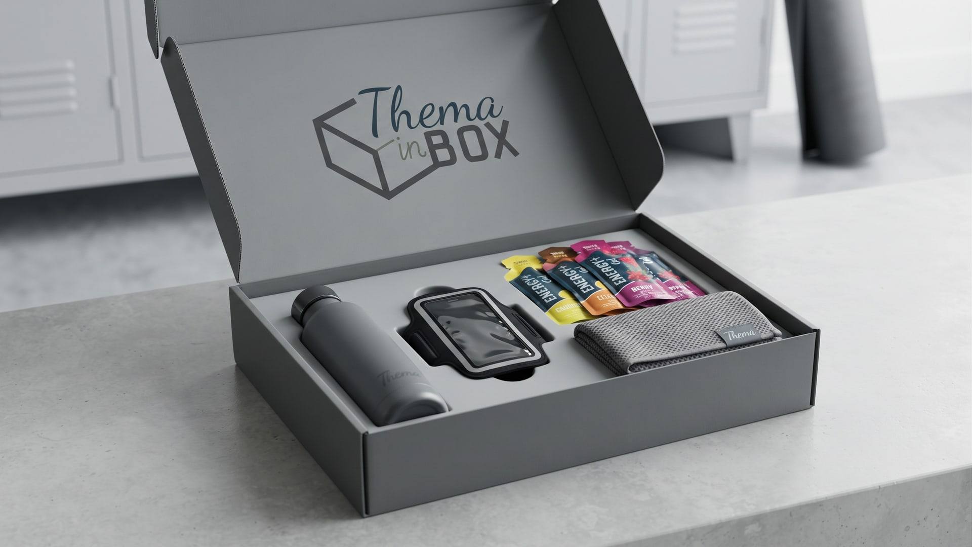 Kit Thema in Box de esportes aberto, com garrafa térmica, braçadeira para celular, géis de energia e toalha esportiva